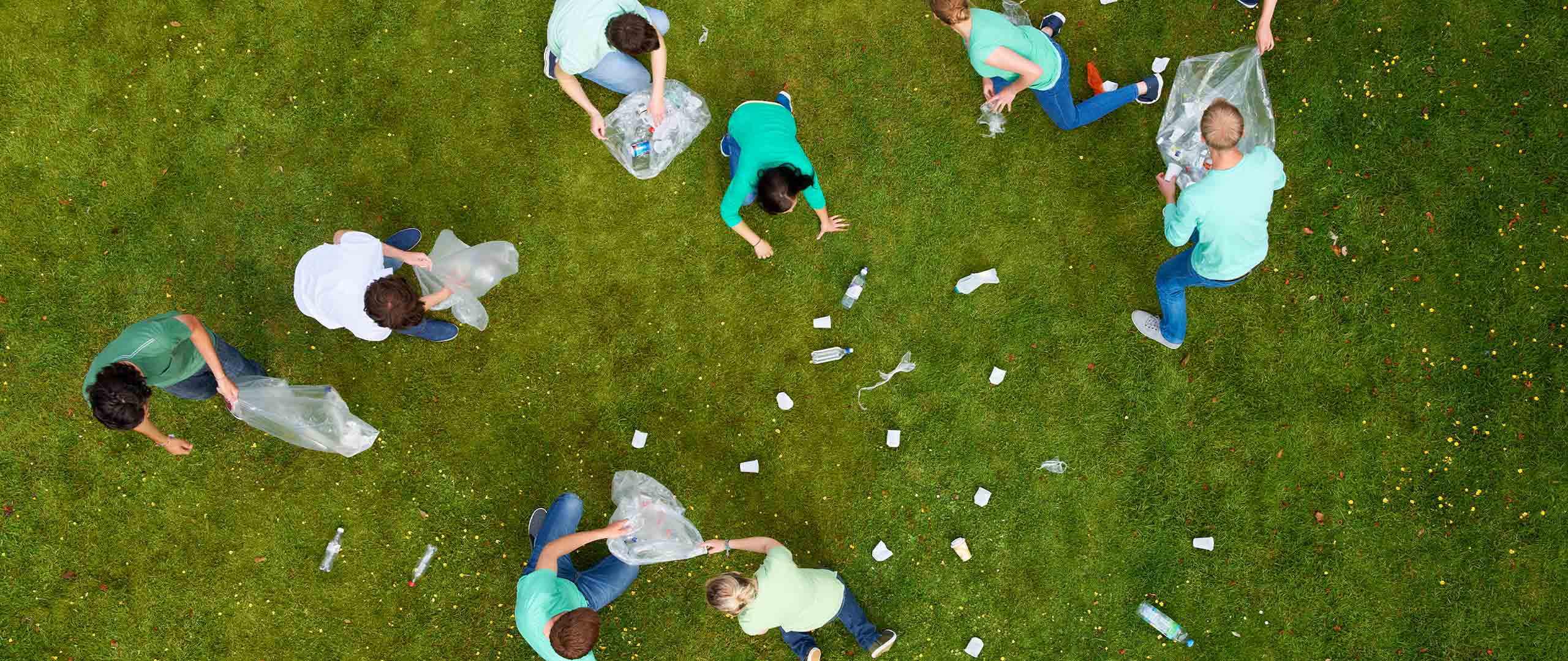 Drone photo of people picking up trash